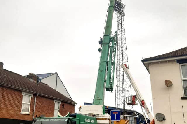The last floodlight pylon at Fratton Park coming down. Picture: Steve Hopes