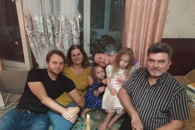 Andrii Zharikov, his mum Tetyana Zharikova, dad Victor Zharikov and sister Anna-Maria Zharikova
And his aunt Olga Grabarchuk and her twin daughters aged 5 (Masha and Dasha)