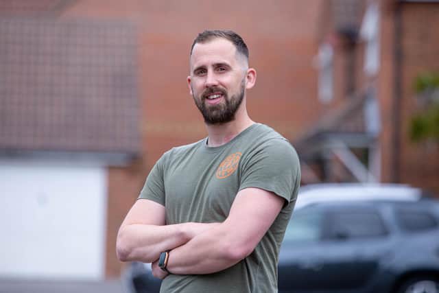 Glen Eastick is a personal trainer who had a stroke while giving an online PT session. Luckily his girlfriend Bex noticed and called an ambulance to get him into QA Hospital quickly. He has since had an operation to repair a hole in his heart that caused the stroke.Glen is calling for better awareness and more money to be spent on stroke awareness.Pictured: Glen Eastick at his home in Havant on Wednesday 11th May 2022Picture: Habibur Rahman
