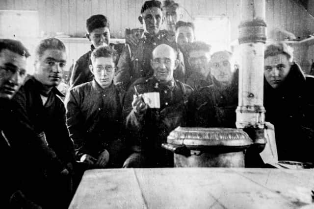 Robert Grant celebrates his 100th birthday at his home in Fareham on Monday 4th April 2022
Pictured: Copy pictures of Robert Grant when he was in the army in 1940. Robert on the far right. Picture title, Gilkicker Camp 1940