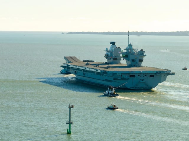 HMS Prince of Wales sailing out of Portsmouth as she heads for a huge Nato deployment in the North Sea. Picture: Michael Woods - Solent Sky Services.