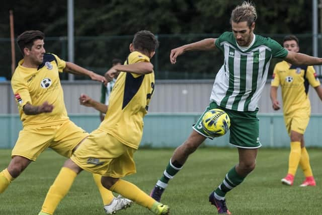 Scott Jones, right, made his AFC Portchester debut in the FA  Vase home loss to Phoenix Sports. Picture by Tommy McMillan