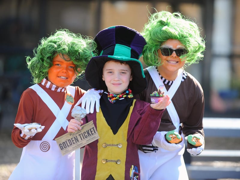 Gomer Junior School in Gosport, dressed as their favourite book characters, baked caked and took part in online quizzes to mark World Book Day. Pictured is: (middle) Charlie Crocker (10) as Willy Wonka with (left) Oliver Clark (9) and Sophie Shields (10) as Oompa-Loompa's.Picture: Sarah Standing (070324-6412)