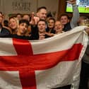 Optimistic England fans during the first half against France in the Leopold Tavern in Southsea. Picture: Matthew Clark