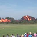 Undated Handout file video grab issued by Sussex Police and the Crown Prosecution Office of the aircrash during the Shoreham Airshow on August 22 2015 where Pilot Andrew Hill was performing a stunt in a 1950s Hawker Hunter before it plummeted onto the A27 in West Sussex and exploded into a fireball killing 11 men Picture: Sussex Police/CPS/PA Wire