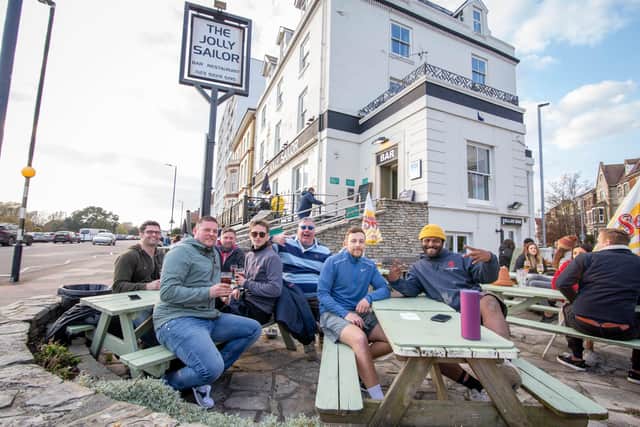 Friends enjoying a pint at the Jolly Sailor, Southsea on Friday 

Picture: Habibur Rahman