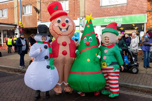 Locals braved the cold to celebrate the start of the Christmas festivites with a street party on Hayling Island on Saturday afternoon.
Pictured - Performers from the Warner Theatre Company came dressed to impress
Photos by Alex Shute