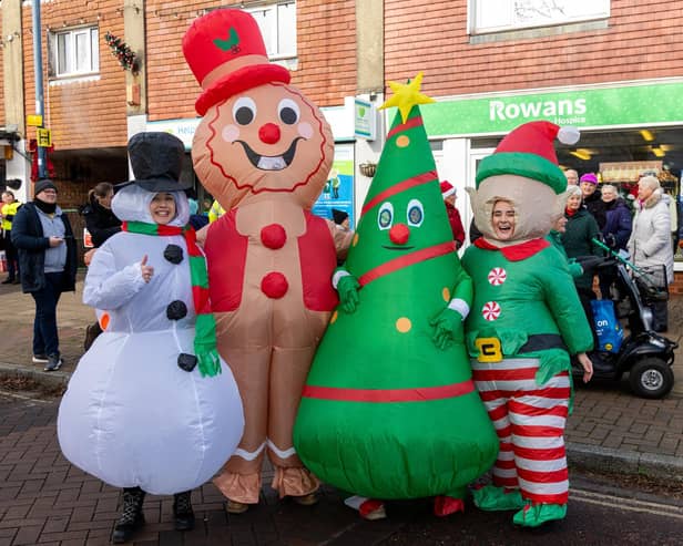 Locals braved the cold to celebrate the start of the Christmas festivites with a street party on Hayling Island on Saturday afternoon.

Pictured - Performers from the Warner Theatre Company came dressed to impress

Photos by Alex Shute