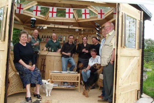 Ah, remember when you could invite people over to your garden. The Rugby Pub won the competition in 2008
Designed and built by owner Tim ,with eight roof lights in octagonal roof, pair of double doors opening as one entrance in fine weather, 15' fully fitted bar with additional door behind and storage under including 3 fridges, blinds to windows and roof lights, ceiling fan, sink with cold running water, comfortably furnished with sea grass matting floor, Hammock. No phone, no TV ,no interruptions ,no shortage of liquid refreshment, no inclination to go any where else and no need to.