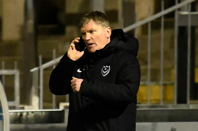 Joe Gallen on the phone to Kenny Jackett during last night's 3-1 defeat at Bristol Rovers. Picture: Graham Hunt/ProSportsImages