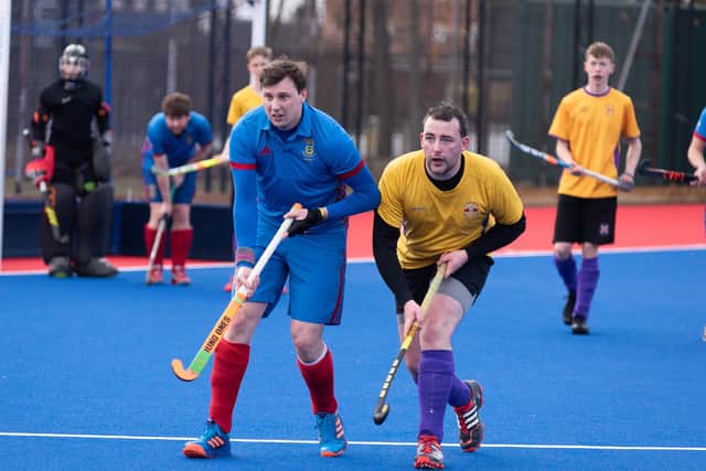 James Dudley (blue) set up US Portsmouth 2nds' equaliser against Haslemere.
Picture: Duncan Shepherd