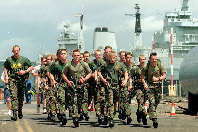 Royal Marines from HMS Fearless take part in the Round the Basin Run, organised by FSL at the Dockyard.Picture: Luke MacGregor 012979_Race