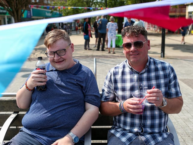 Brad Smith and his father, Shaun Smith, right. Waterlooville Music and Arts Festival took place in the precinct, Waterlooville
Picture: Chris Moorhouse (170824-59)
