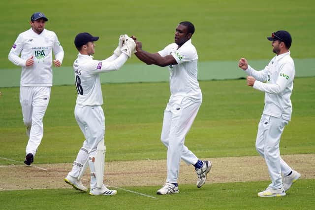 Hampshire's Keith Barker (centre) celebrates taking the wicket of Middlesex's Martin Anderson at Lord's yesterday. Picture: Adam Davy/PA Wire.