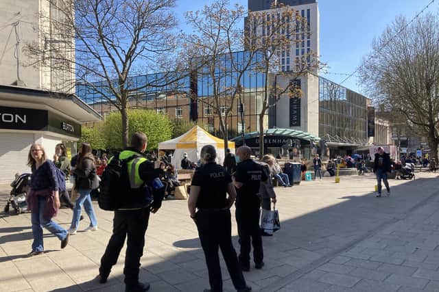 Police investigate as objects thrown off abandoned Debenhams store in Commercial Road on April 17. Pic Steve Deeks