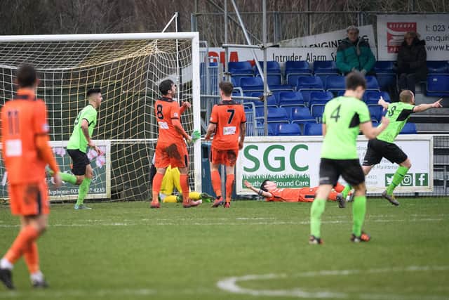Craig Harding, far right, wheels away after scoring Alresford's winner at Portchester last December.  Picture: Keith Woodland