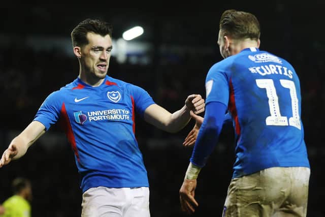 John Marquis celebrates with Ronan Curtis. Picture: Joe Pepler