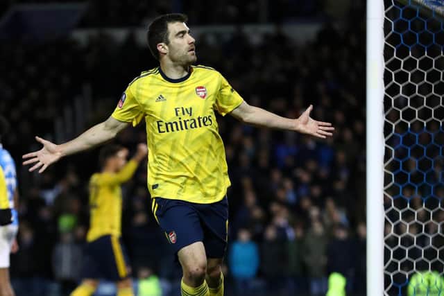 Sokratis Papastathopoulos celebrates after scoring Arsenal's first goal against Pompey. Picture: Dan Istitene/Getty Images