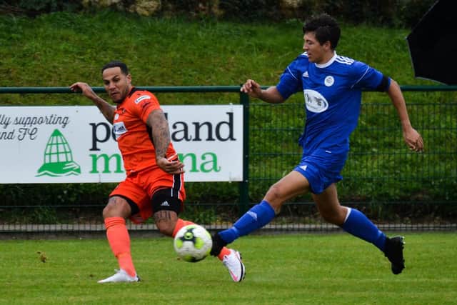 Barry Mason, left, in action for Portchester during their 3-0 win at Portland. Pic: Dan Haswell.