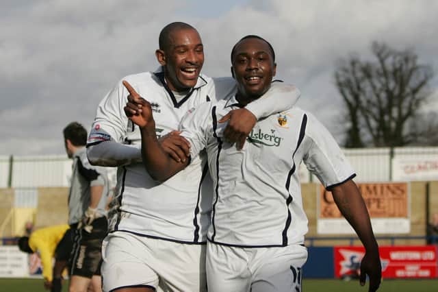 Jefferson Louis, left, and his cousin Richard Pacquette celebrate a Hawks goal in March 2007. Pic: Dave Haines.