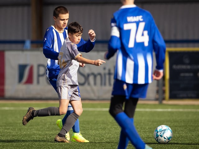 Action from the U15 Campbell McFaull Invitation Cup final between Hayling St Andrews Blue and Hayling St Andrew White. Picture: Keith Woodland (260221-4)