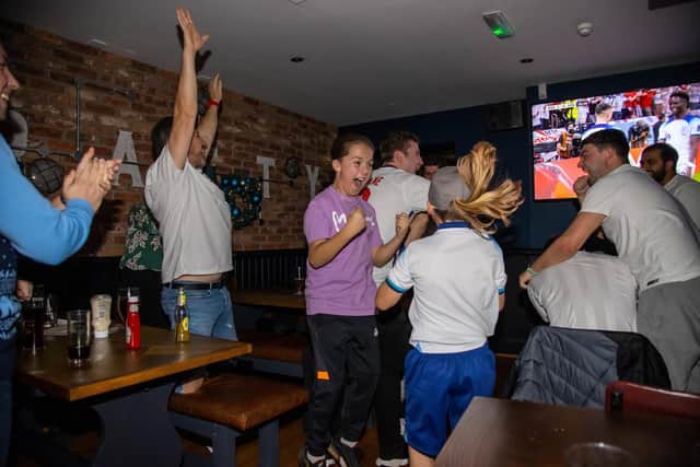 England fans in the Red Lion pub were 'surprised' and delighted by England's confident 3 - 0 victory against Senegal.