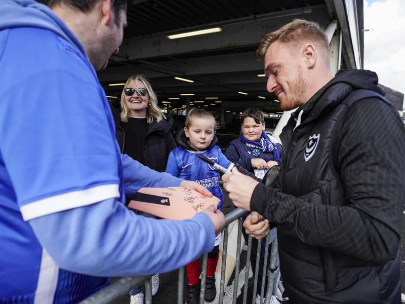 Jack Sparkes makes these fans' day before entering Fratton Park.