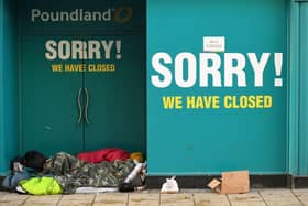 A closed down Poundland shop. 
Photo by OLI SCARFF/AFP via Getty Images
