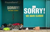 A closed down Poundland shop. 
Photo by OLI SCARFF/AFP via Getty Images