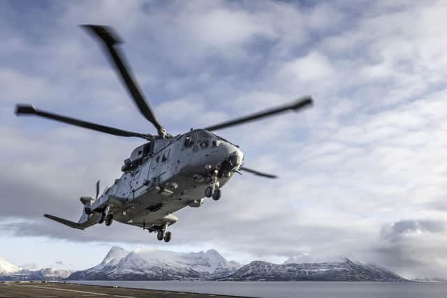 Pictured: Royal Navy Merlin Mk4 landing on board the Amphibious Assault Ship, HMS Albion whilst on deployment in Norway for Exercise Cold Response.

HMS ALBION AND EXERCISE COLD RESPONSE IN NORWAY

Exercise Cold Response 2022 is the winter deployment in Norway directing Commando Forces to establish the cold weather skills, both individual and collective, to deliver success on Cold Response. The conclusion of this shaping activity, force elements will be located in the north of Norway, at multiple locations, and afloat. UK Commando Force (UKCF) will aggregate and rehabilitate all force elements ready to commence Cold Response. The scenario will be used as the geopolitical construct for the exercise, with
UKCF conducting Advance Force Operations to enable NATO partner nations, at Littoral Strike Group scale.