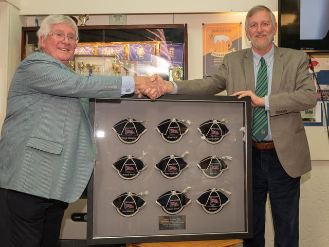Mike Smith from the Hockey Museum presents framed GB caps to Havant chairman Chris Pickett. Picture: Keith Woodland