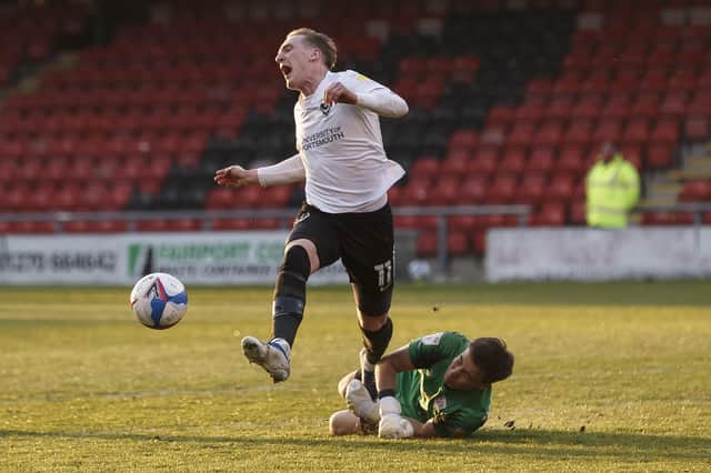 Ronan Curtis is fouled by Crewe keeper Will Jaaskelainen. Picture: Daniel Chesterton/phcimages.com