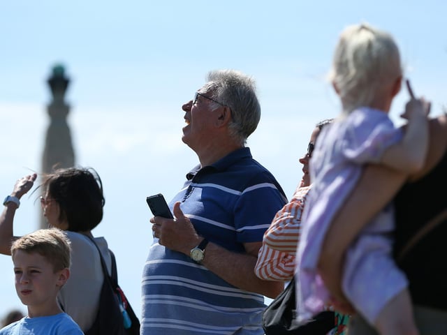 Crowds watch the kites take to the sky at the Portsmouth International Kite Festival, Southsea Common.Picture: Chris  Moorhouse (270724-22)
