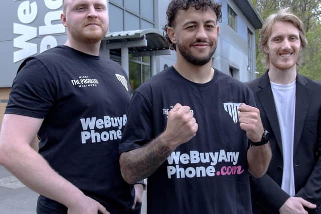 Pictured: (L-R) are: Mitchell Grant-Philips, Head of Operations at WeBuyAnyPhone.com; Michael McKinson; Charlie Nicholas, Head of Commercial at WeBuyAnyPhone.com