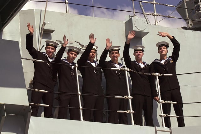 The homecoming of HMS Iron Duke to Portsmouth Naval Base 22nd August 2003. Sailors on board HMS Iron Duke wave to the waiting families on the quayside as they come alongside PICTURE: MALCOLM WELLS ( 034194-100 )