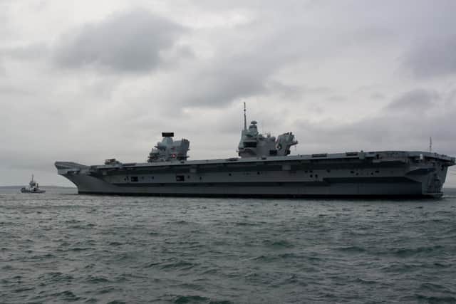 The Royal Navy’s aircraft carrier HMS Queen Elizabeth has docked in Portsmouth with F-35B jets on board. (Photo: Ben Mitchell/PA Wire)