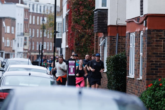 Runners hit the streets in wet and windy conditions despite The Great South Run being cancelled.