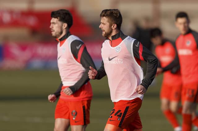 Michael Jacobs, seen here with John Marquis warming up before kick-off at Fleetwood, believes Pompey deserved their 1-0 win. Picture: Daniel Chesterton/phcimages.com