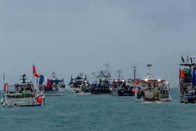 Dozens of French boats arrived at the Jersey harbour on Thursday morning, with some crews setting off flares during the so far peaceful protest. Picture: Gary Grimshaw/Bailiwick Express/PA Wire