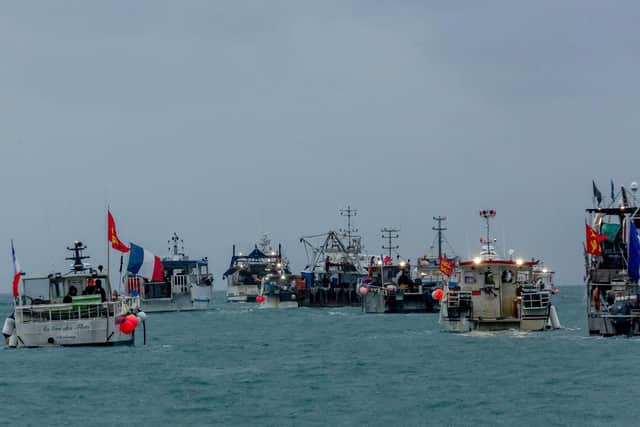 Dozens of French boats arrived at the Jersey harbour on Thursday morning, with some crews setting off flares during the so far peaceful protest. Picture: Gary Grimshaw/Bailiwick Express/PA Wire