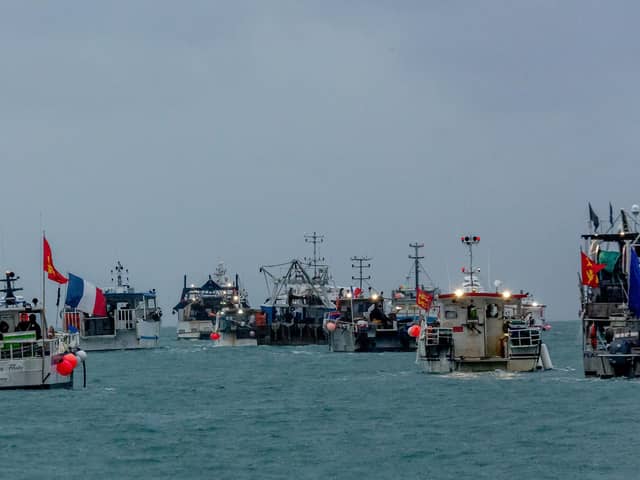 Dozens of French boats arrived at the Jersey harbour on Thursday morning, with some crews setting off flares during the so far peaceful protest. Picture: Gary Grimshaw/Bailiwick Express/PA Wire