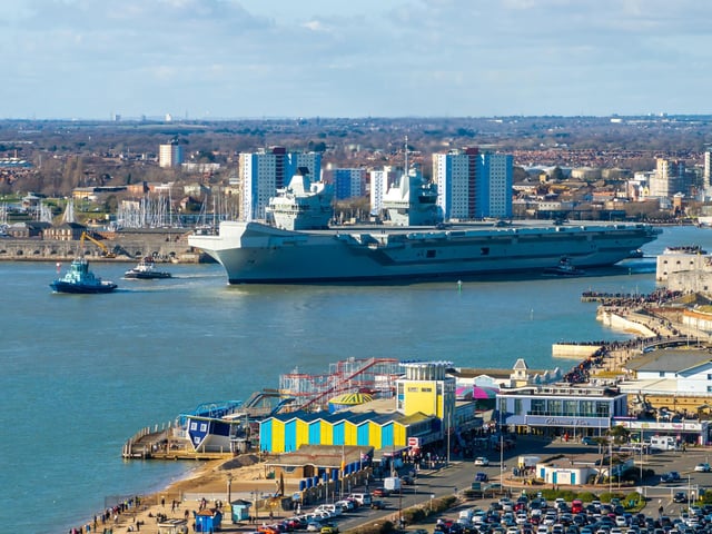 HMS Prince of Wales sailing out of Portsmouth as she heads for a huge Nato deployment in the North Sea. Picture: Michael Woods - Solent Sky Services.
