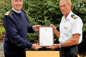 First Sea Lord, Admiral Tony Radakin, presenting a Gold Valedictory Certificate to Lt Cdr Al Cronin MBE.

Picture: Royal Navy