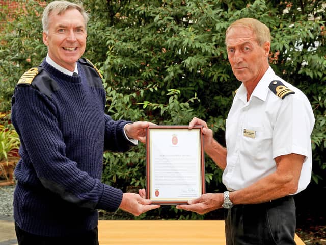 First Sea Lord, Admiral Tony Radakin, presenting a Gold Valedictory Certificate to Lt Cdr Al Cronin MBE.

Picture: Royal Navy