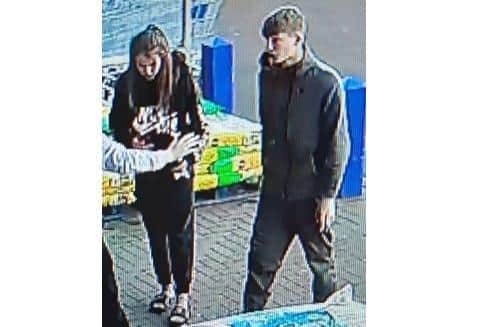 Police would like to speak to the man and woman captured here on CCTV following an assault on a security guard at B&M stores on Auckland Road, Southampton on Thursday 31 March.