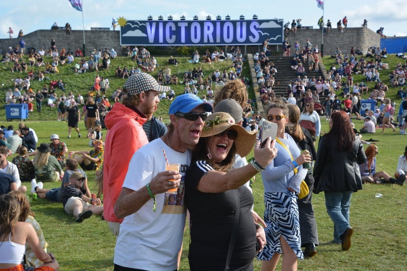 Festival-goers take a selfie in front of the Victorious sign at the Victorious Festival in Southsea, Hampshire. Picture date: Friday August 25, 2023. Pic: Ben Mitchell/PA Wire