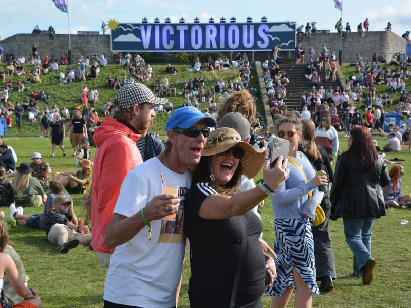Festival-goers take a selfie in front of the Victorious sign at the Victorious Festival in Southsea, Hampshire. Picture date: Friday August 25, 2023. Pic: Ben Mitchell/PA Wire