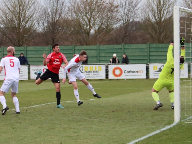 Jack Breed heads in his second goal, and Fareham's fourth. Picture by Ken Walker
