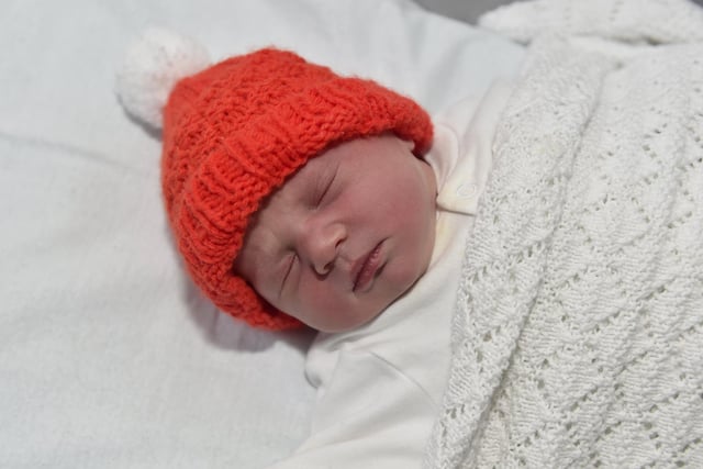 Eva Cooke born on Christmas Day at 7.38am weighing 6lb 14oz to parents Charlotte and Sam Cooke both 34 from Bournemouth. Eva was born via a surrogate from Havant. 

Picture: Sarah Standing (261223-4100)