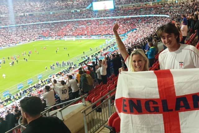Caroline Dinenage, Gosport MP, celebrates England's victory over Denmark at Wembley.`